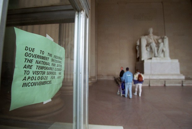 A sign hangs in the window of an information booth Saturday, Decemeber 16, 1995 at the Lincoln Memorial in Washington, D.C. announcing the temporary closure of the memorial due to the government shutdown. (AP/ Mark Wilson)