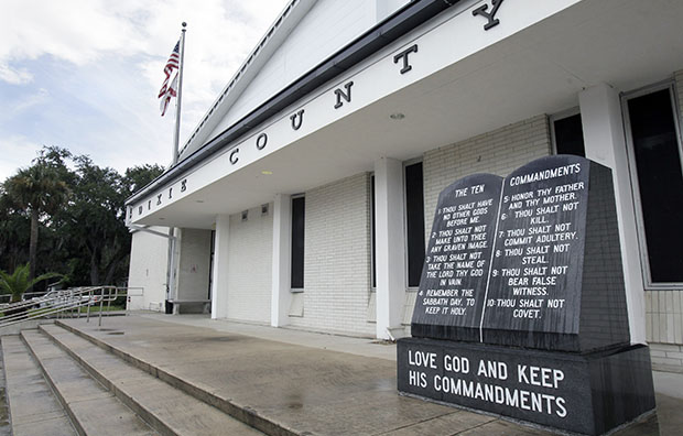 The Ten Commandments monument is seen in front of the Dixie County Courthouse in Cross City, Florida, July 27, 2011. (AP/John Raoux)