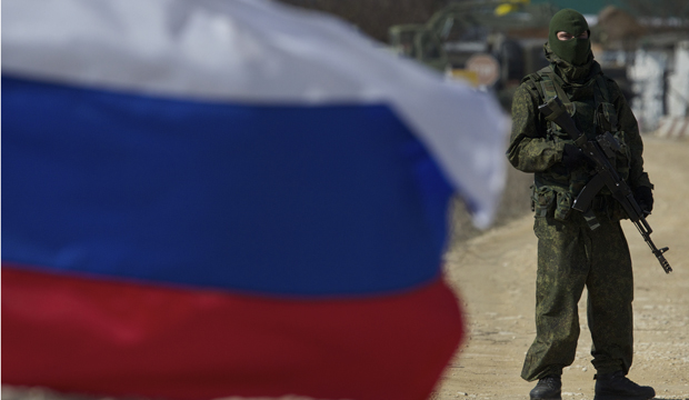 Pro-Russian soldiers block the Ukrainian naval base in the village of Novoozerne, west of the Crimean capital of Simferopol, Ukraine. (AP/Ivan Sekretarev)