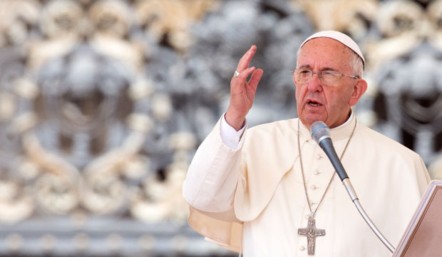 Pope Francis delivers a blessing at the end of his weekly general audience in St. Peter's Square on June 24, 2015. (AP/Riccardo De Luca)