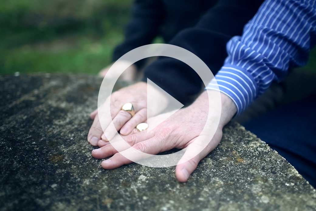  (Video thumbnail; two people holding hands)