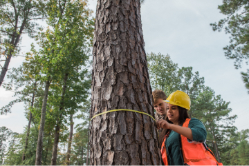 Olivia Cohea in the field during a forestry class.