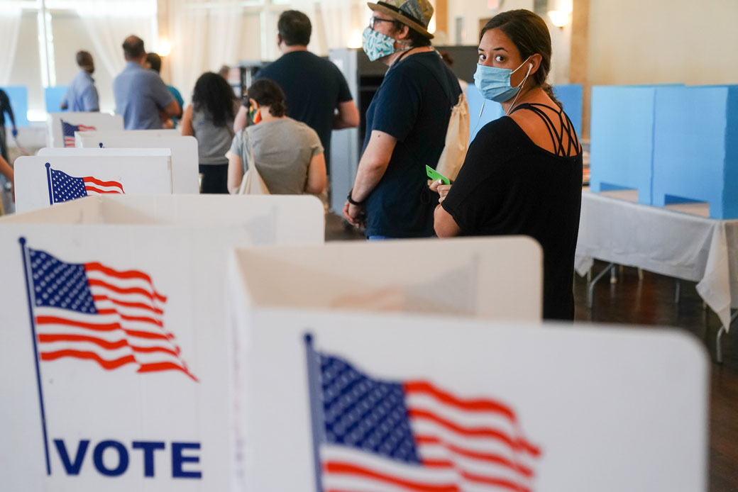 People wait in line to vote in Georgia's primary election on June 9, 2020, in Atlanta. (Getty/Elijah Nouvelage)