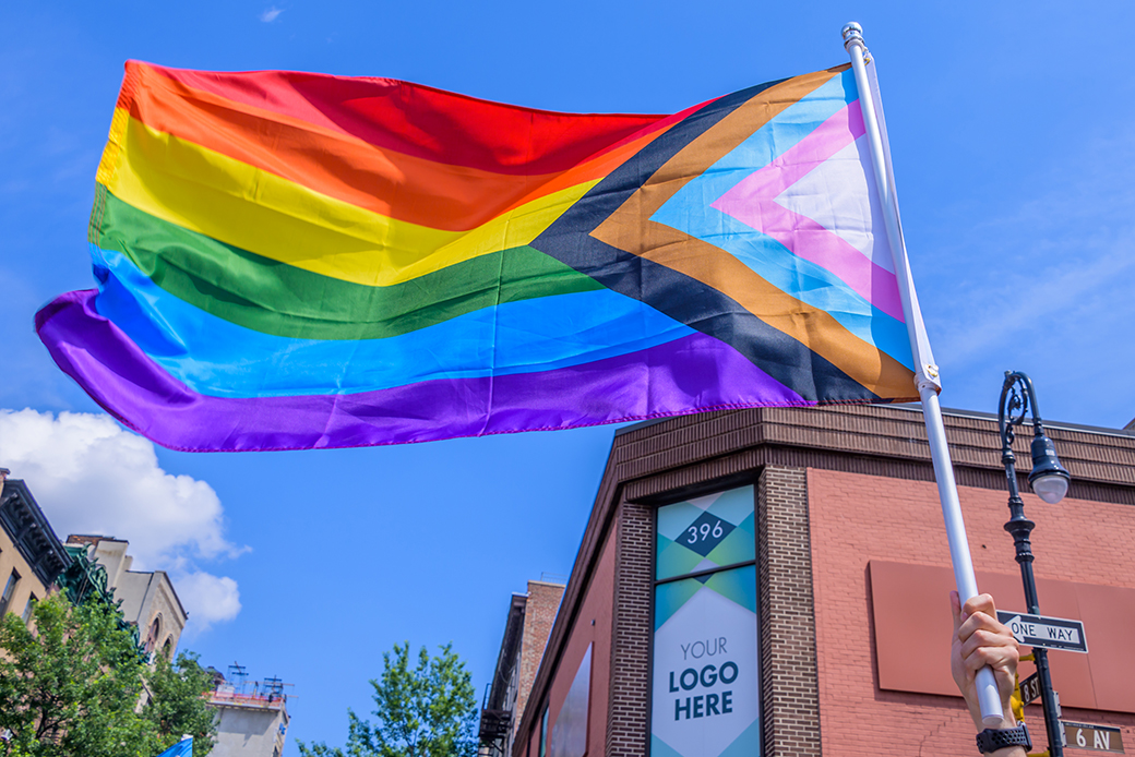 A participant holds a rainbow flag as the Reclaim Pride Coalition takes to the streets of Manhattan for the second annual Queer Liberation March, June 2020. (Getty/Erik McGregor)