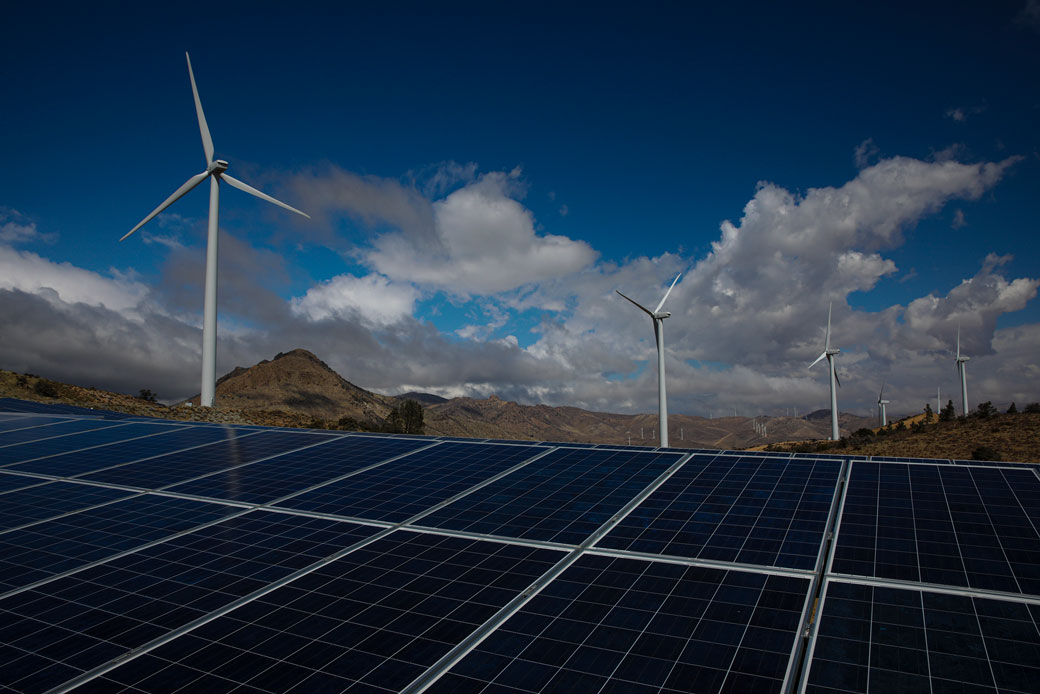 (A wind farm and solar power plant are nestled among the Tehachapi Mountains in Kern County, California, March 2021.)